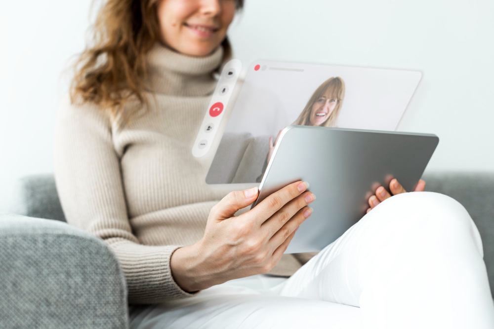 Woman on a telehealth video call with a tablet